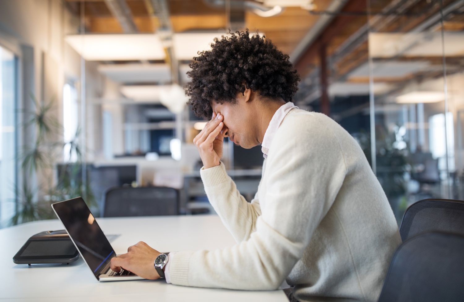 Person looking stressed at work